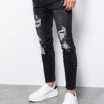 Ombre Clothing Černé rifle s módními dírami P1065